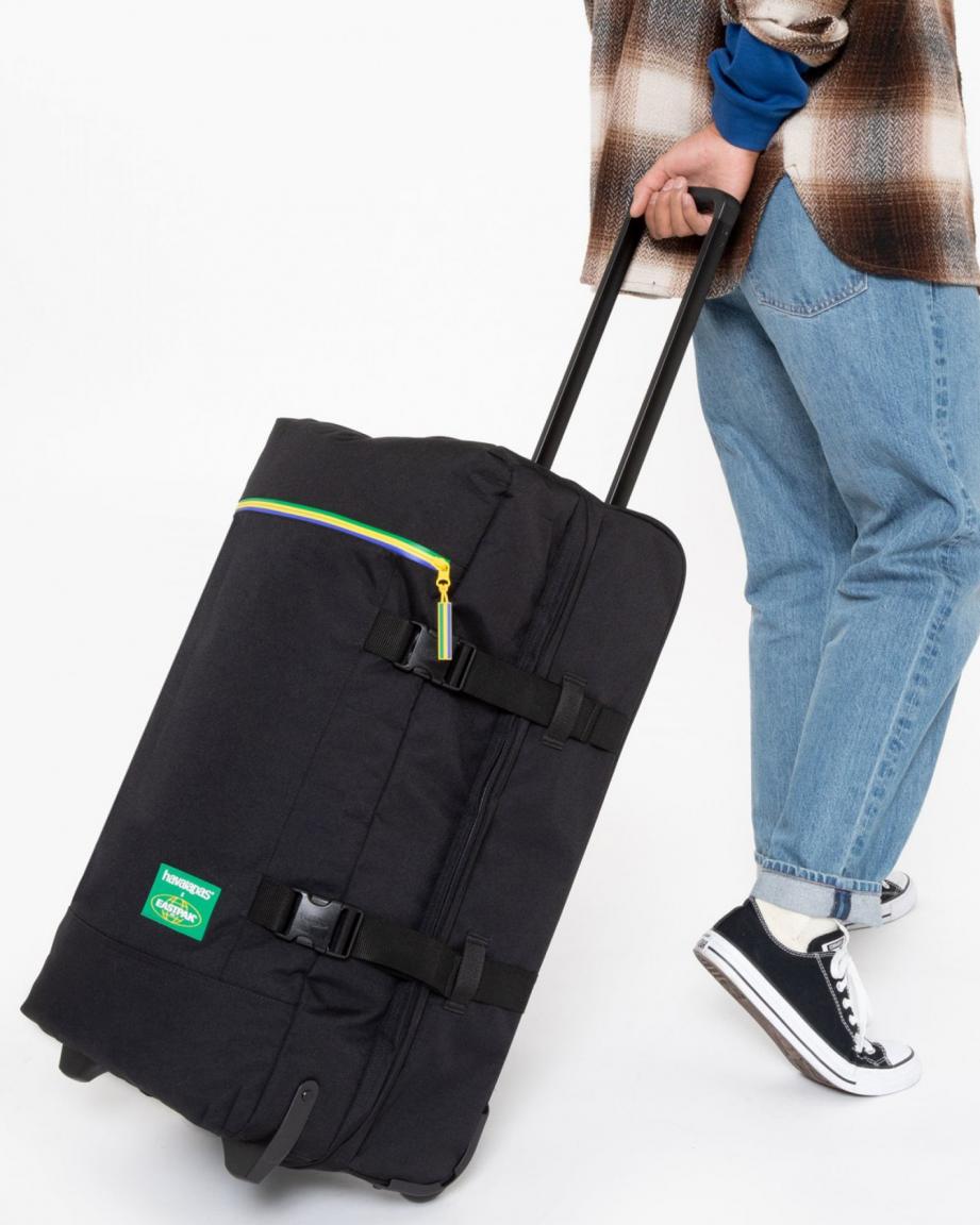 Taschentrolly Eastpak Havaianas Tranverz L schwarz mit einem bunten Streifen